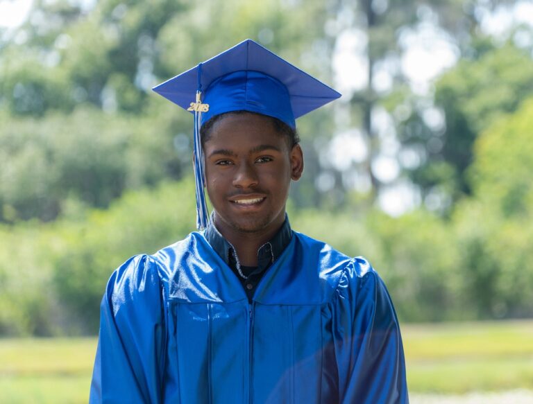young african american man graduating.